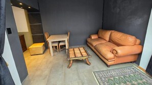 Chambre Double Deluxe | Coin séjour