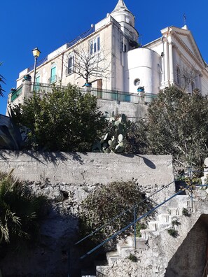 A building with a classical architectural style, featuring a dome and a bell tower. - BLURAITO AMALFI COAST (VIETRI SUL MARE)