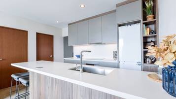 Fridge, microwave, stovetop, coffee/tea maker