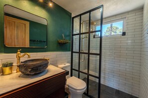 Shower, eco-friendly toiletries, towels, soap