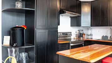 Fridge, microwave, stovetop, coffee/tea maker