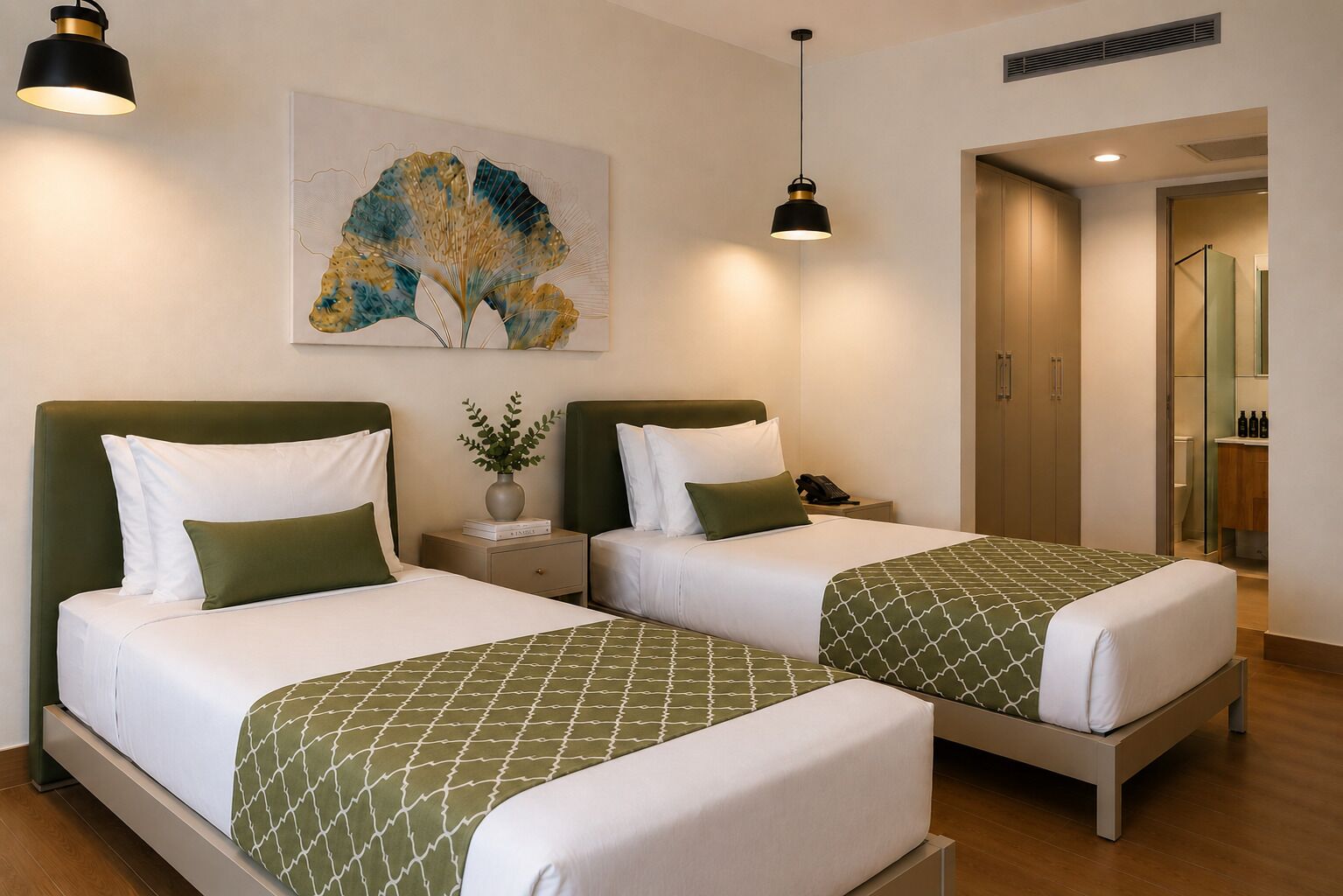 A hotel room with two beds, a nightstand, a vase with a plant, and a painting on the wall.