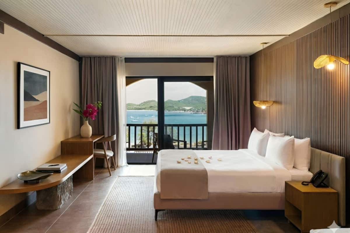 Deluxe Double Room, Balcony, Ocean View | In-room safe, desk, laptop workspace, iron/ironing board