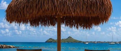 On the beach, sun-loungers, beach umbrellas, beach towels