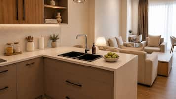 Junior Suite, Balcony, Sea View | Living area | 65-inch LED TV with satellite channels