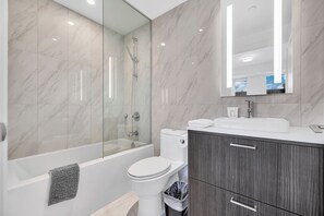 Shower, hair dryer, towels, soap - Luxury 2BR/2BA at The Well | Pool, Gym & Downtown Views (Toronto)