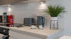 Fridge, microwave, oven, cookware/dishes/utensils - Bournemouth apartment walking distance to beach (Dorset)
