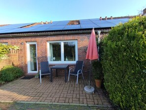 Terrace/patio - Apartment Villa Butterburg Okka - Terraced house with terrace (Dornum)