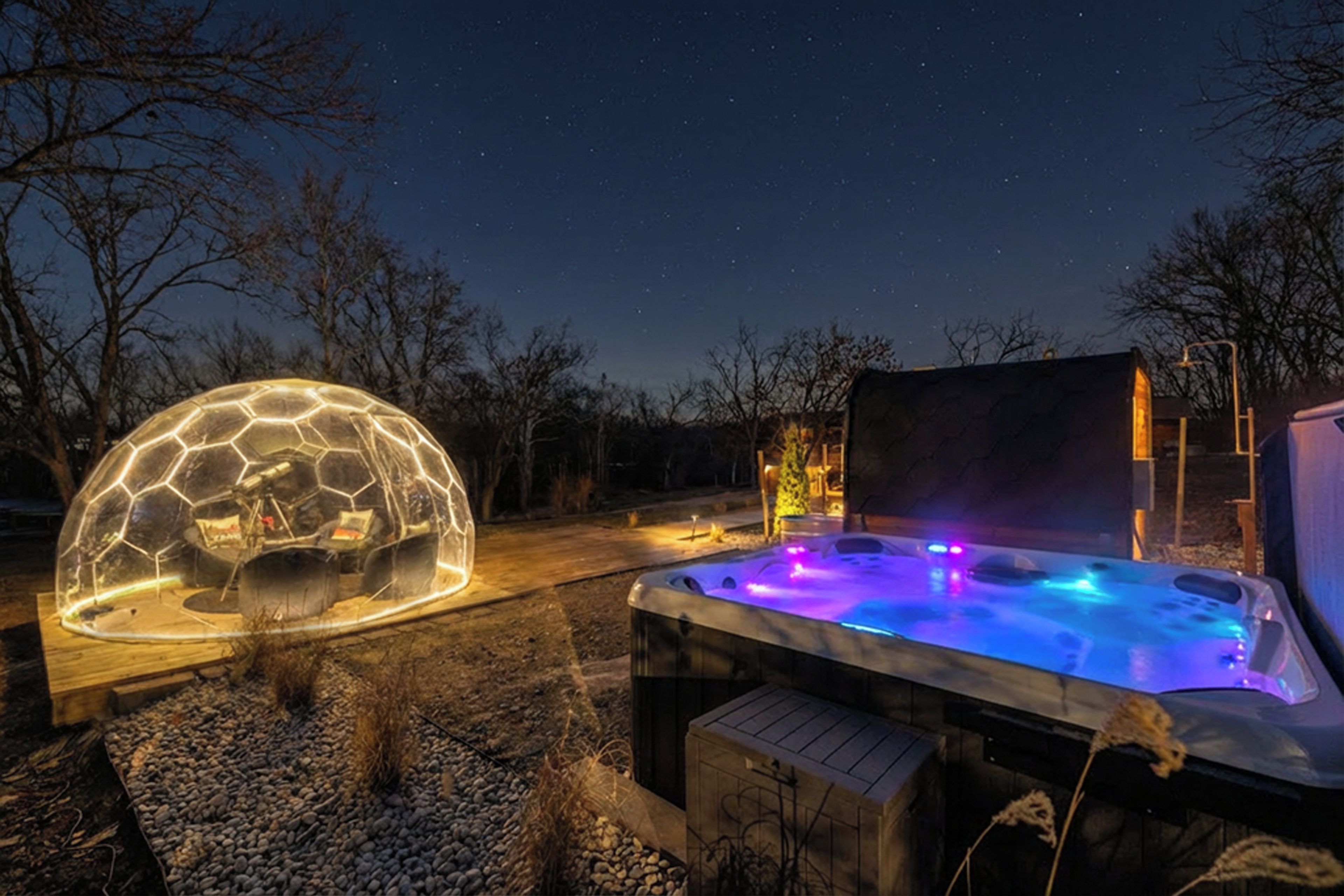 A hot tub with a dome-shaped enclosure and a wooden deck.