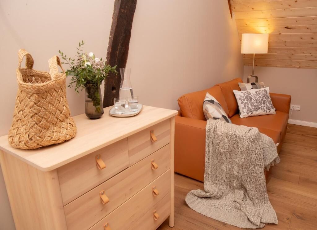 Deluxe-Dreibettzimmer | Wohnbereich