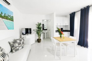 Standard Studio, Balcony, Pool View | Living area - BRISAS TROPICAL playa LOS CORALES (Punta Cana)