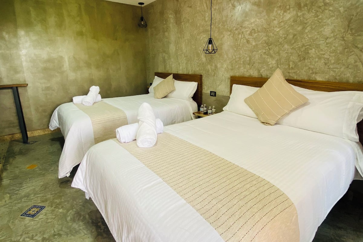 C2 - Deluxe Quadruple Room, Garden View | Premium bedding, down comforters, WiFi (free)