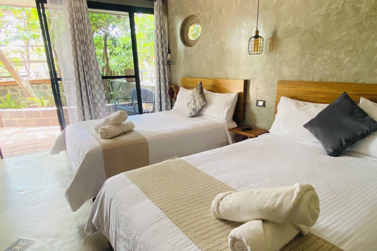 C1 - Deluxe Quadruple Room, Patio, Garden View | Premium bedding, down comforters, WiFi (free)