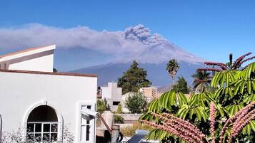 Classic Triple Room, Balcony, Garden View | Property grounds