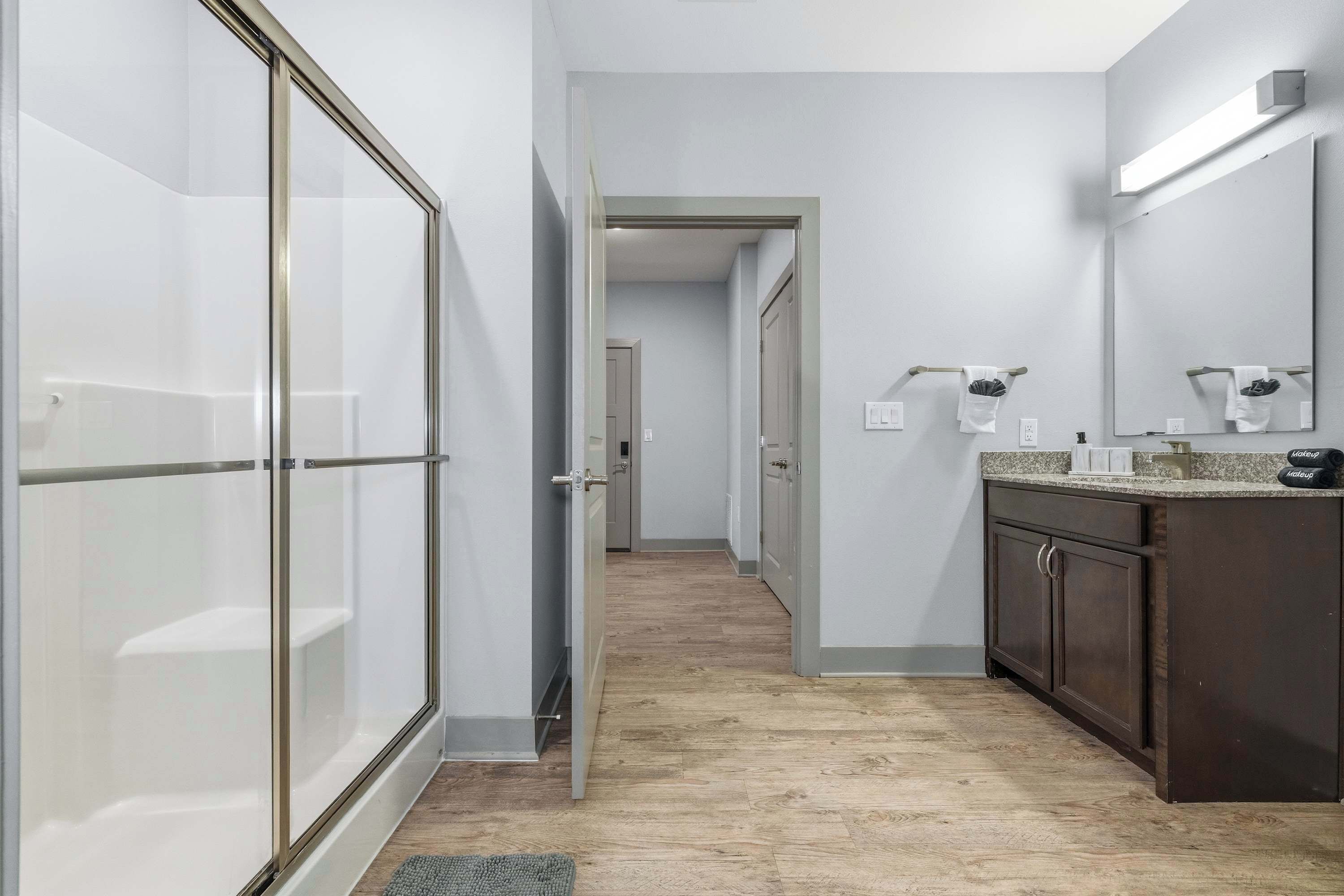Shower, hair dryer, towels, shampoo