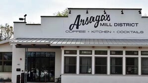 A building with a sign reading "Arsaga's Mill District Coffee Kitchen Cocktails". - On Razorback Trail!  Walk to Dickson, Stadium & UARK (Fayetteville)