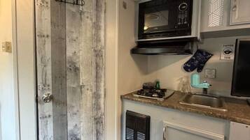Microwave, stovetop, coffee/tea maker, toaster