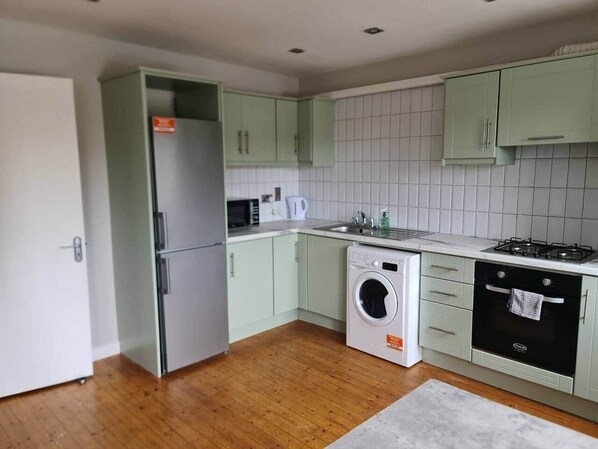 Fridge, stovetop, cookware/dishes/utensils