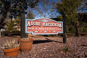 A sign for Adobe Hacienda Bed & Breakfast Inn. - Adobe Hacienda Resort Luxury Two Bedroom Suite (Sedona)