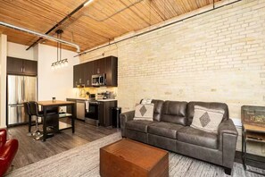 Living area - Bright Exchange District Loft | 1 Bed | 1 Bath | (Winnipeg)
