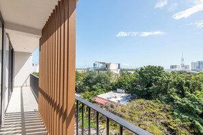 Apartamento, balcón, vistas a la ciudad | Jardines del alojamiento