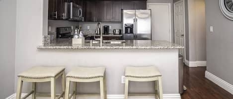 Coffee/tea maker, fridge, microwave, oven