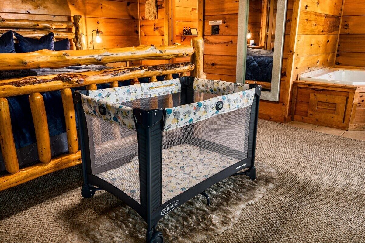 1 bedroom, desk, iron/ironing board, travel crib