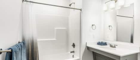 Hair dryer, towels, soap, toilet paper