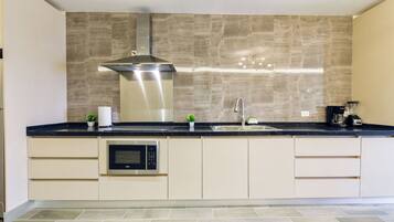 Suite Club, vista a la ciudad | Cocina privada