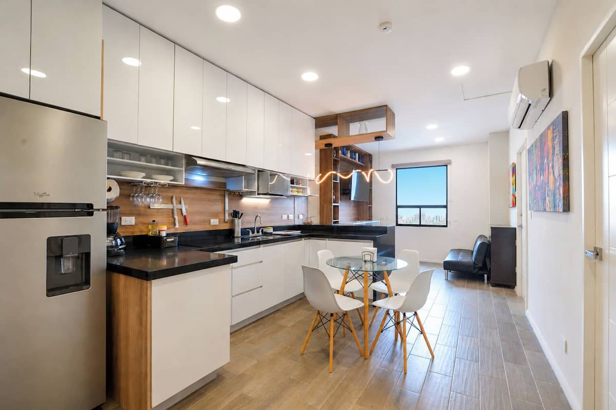 Business Suite, City View | Living area | 55-inch Smart TV with digital channels, streaming services