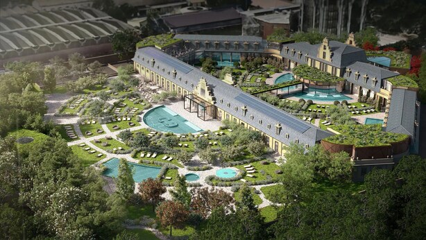 Ein Resort mit mehreren Schwimmbecken, üppigem Garten und verschiedenen Baustilen.