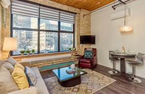 Living area - Modern Exchange District Condo | 1 Bed | 1 Bath | (Winnipeg)