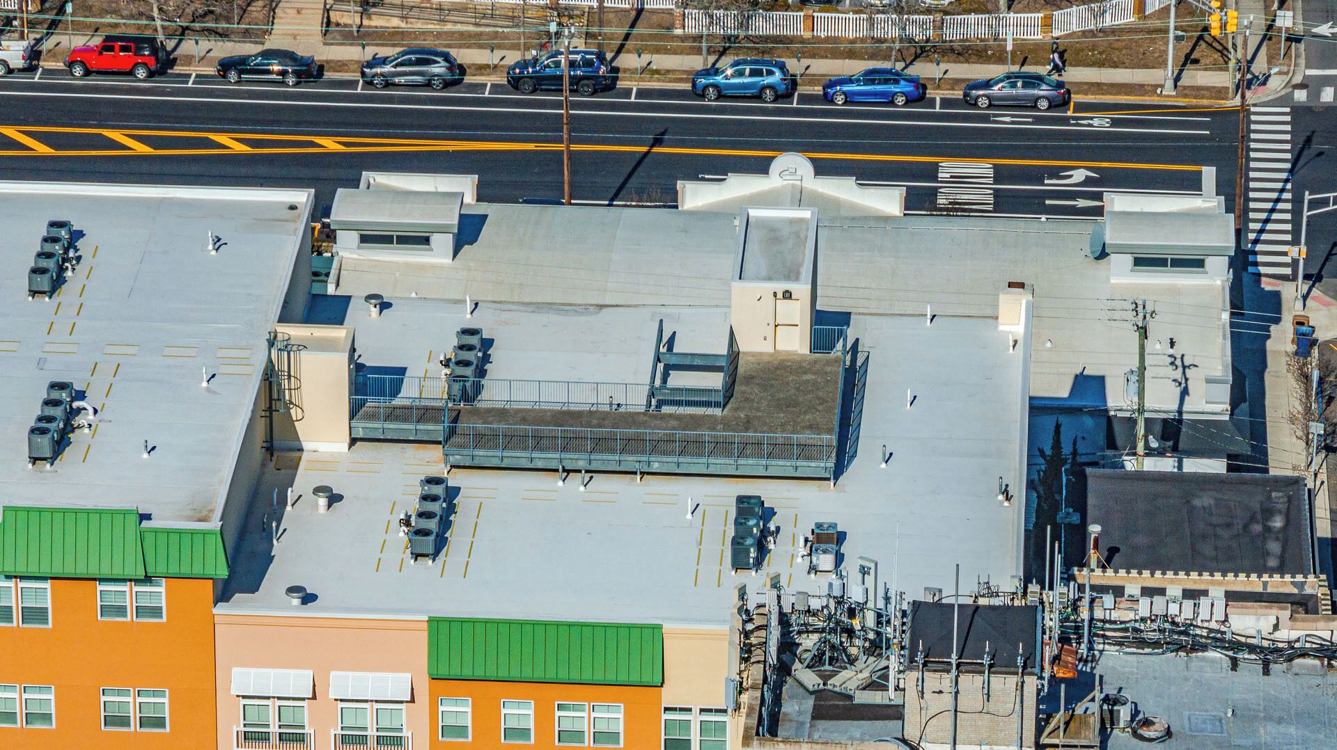 A multi-story parking garage with several levels and a pedestrian walkway.