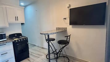 Appart'hÎtel, 1 chambre, patio | Cuisine privée