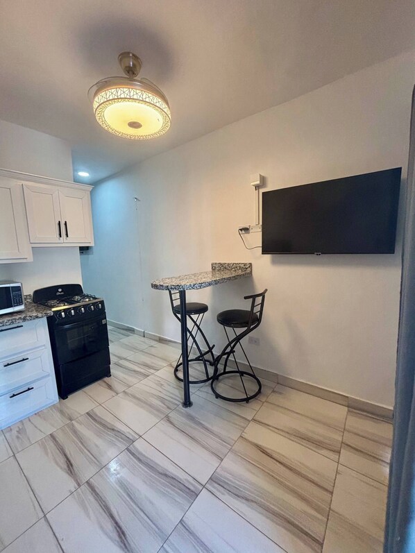 Condo, 1 Bedroom, Patio | Private kitchen - Condo Neuf Dans le Centre-ville de Sosua 104 (Sosúa)