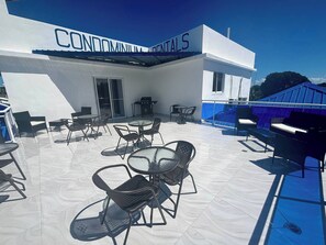 Condo, 1 Bedroom, Patio | Outdoor dining - Condo Neuf Dans le Centre-ville de Sosua 104 (Sosúa)