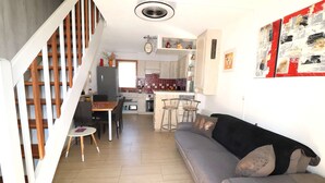 Living area - Cozy house near the sea with terrace, air conditioning, and parking (LE GRAU DU ROI)