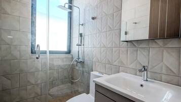 Shower, hair dryer, towels, soap