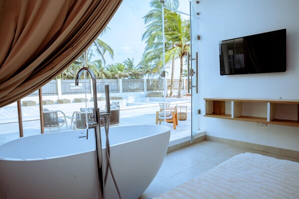 Habitación de lujo, vista parcial al océano | Sábanas italianas Frette y ropa de cama de alta calidad 