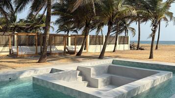 2 outdoor pools, free pool cabanas, pool umbrellas