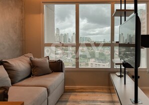 Deluxe Apartment, City View | Living area - STAY Metropolitan Sidney (Goiânia)