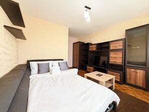 1 habitación, tabla de planchar con plancha, wifi y ropa de cama 