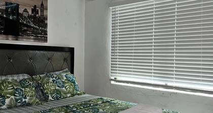 Spacious 3-bedroom apartment in serene chalan Pago with AC