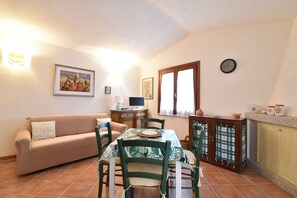 TV, fireplace - Two-room cottage with garden a/c and barbecue (Aglientu)