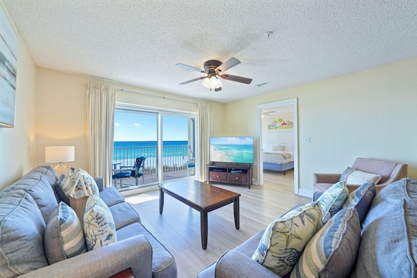 The open living room at Emerald Dunes 202 invites you to relax after a day on the sugar white sands of the Emerald Coast.