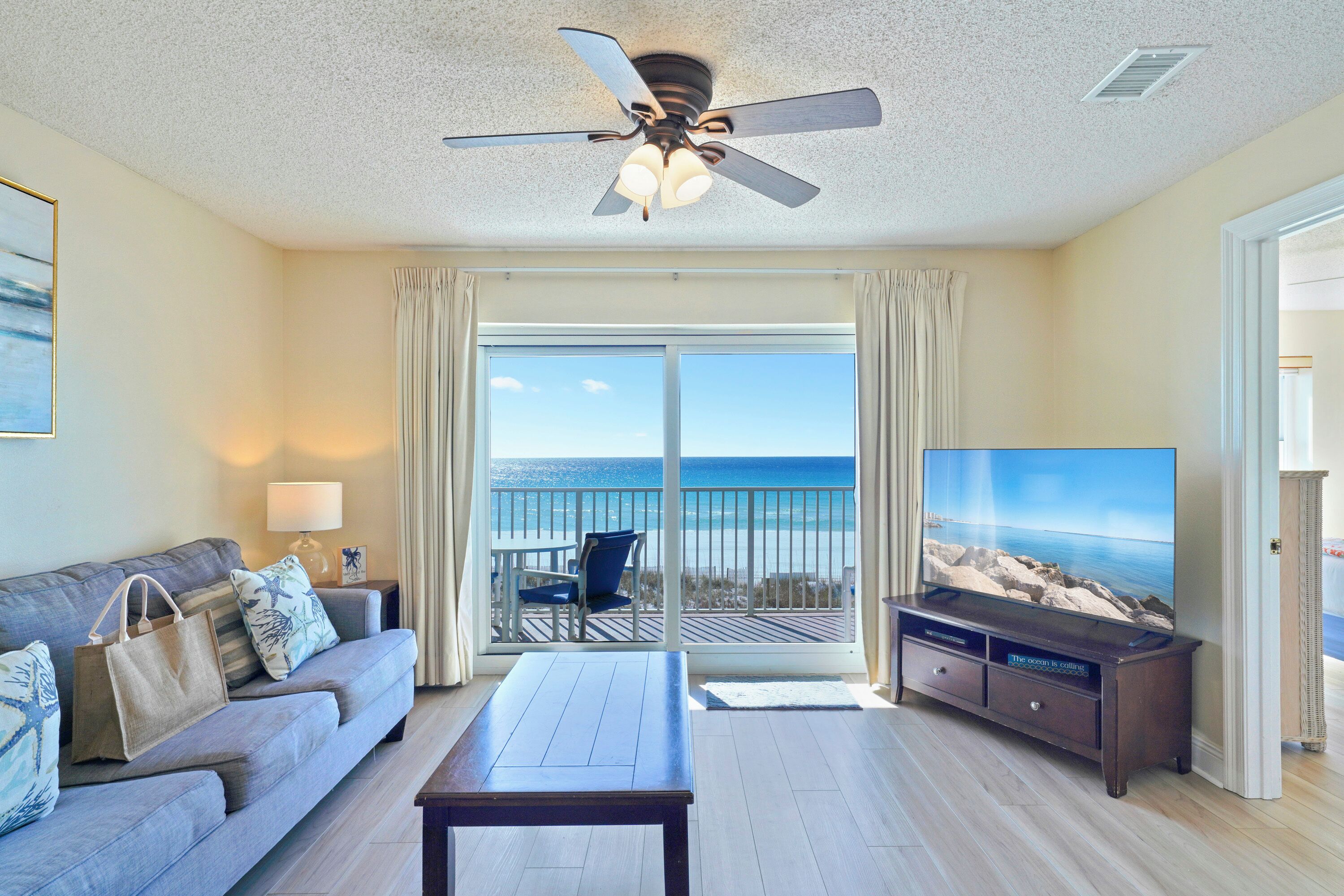 At Emerald Dunes 202, your mornings begin with sunlight pouring through the balcony doors as the emerald waters of the Gulf stretch endlessly before you.