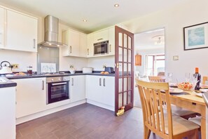 Fridge, microwave, oven, stovetop - Lothlorien in Grange-over-Sands with Bay Views (Grange-Over-Sands)