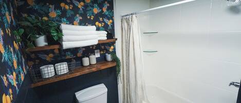 Hair dryer, towels, soap, toilet paper