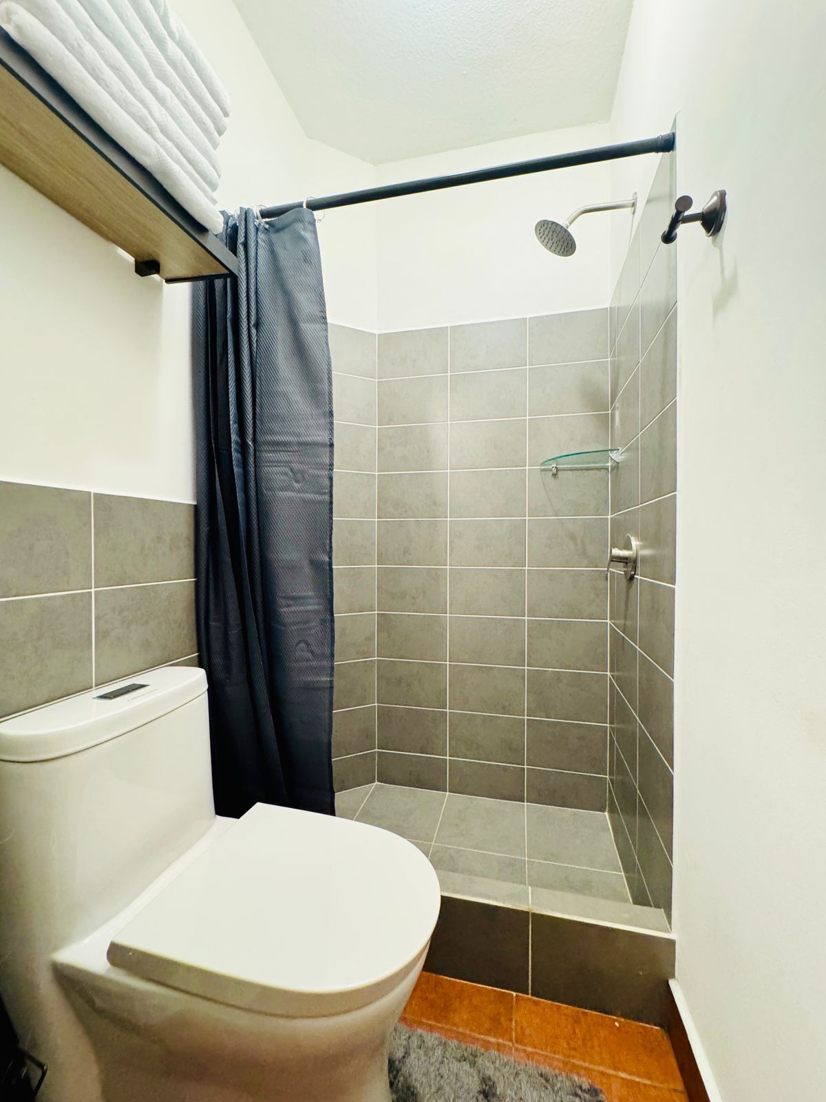 Shower, towels, soap, shampoo