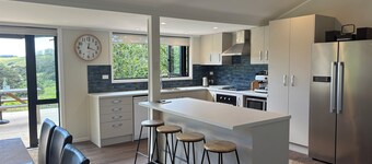 Relax and Unwind in this Farmhouse  surrounded by Native bush and farmland